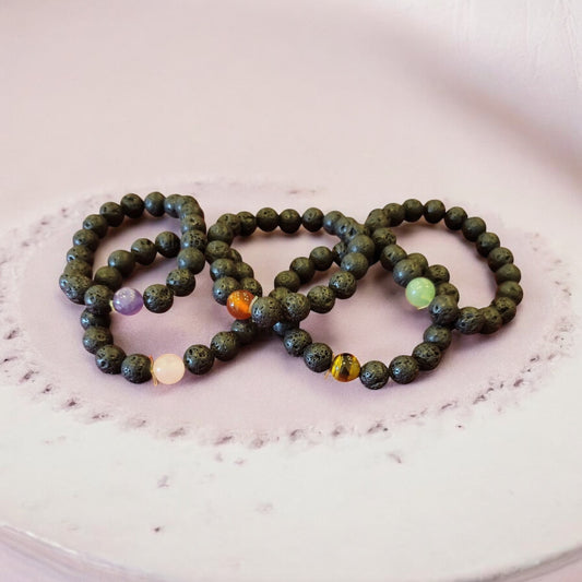 Lava and Gemstone Bead Bracelet includes (2) 1 ml oil bottle (lavender and eucalyptus)