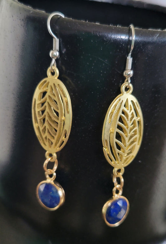 Earrings with blue stone